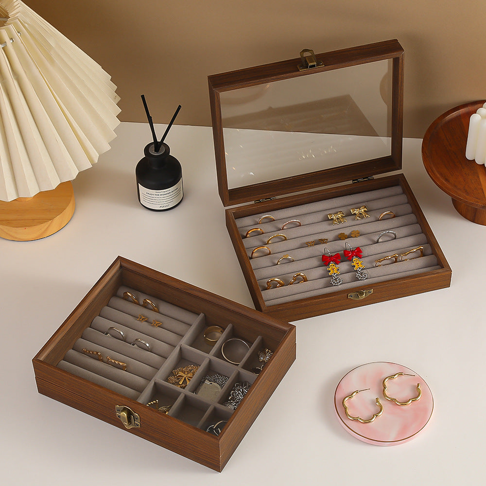 Gray ring cushion jewelry storage box side profile with transparent lid showing gray wood and ring cushion storage