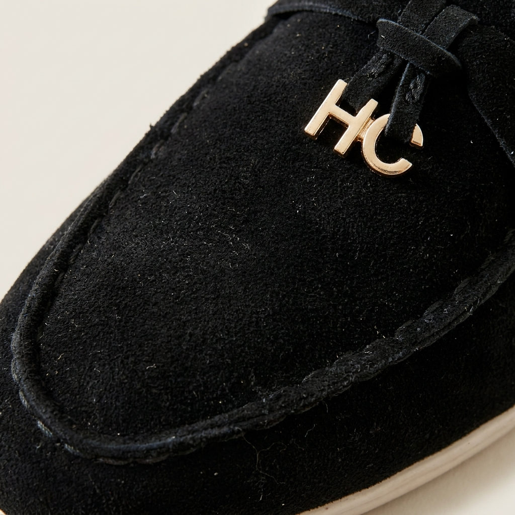 Caramel matte sheepskin suede loafer three-quarter lifestyle close-up showing low heel and round toe slip-on style