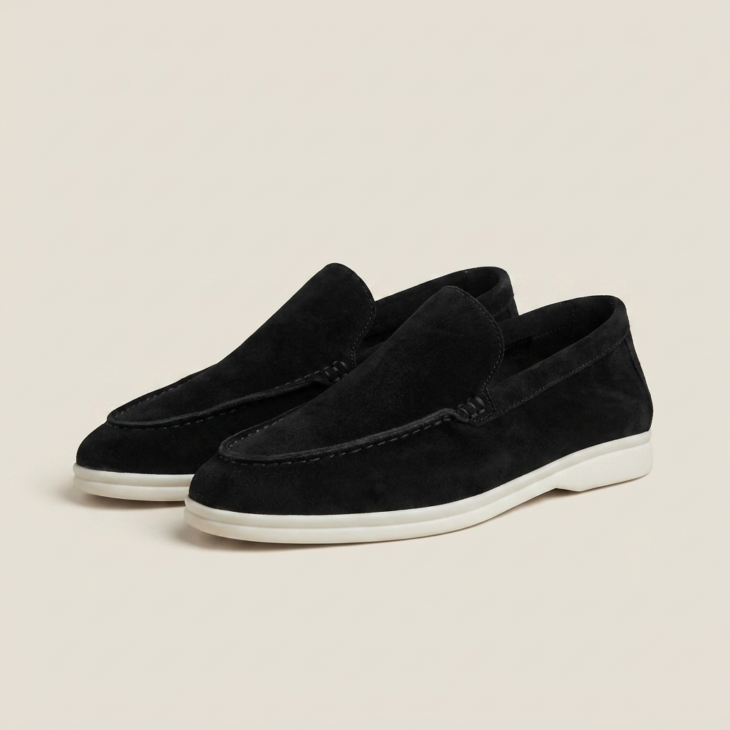 Burgundy suede round toe slip-on loafer shoe shown front view with low flat heel and suede upper