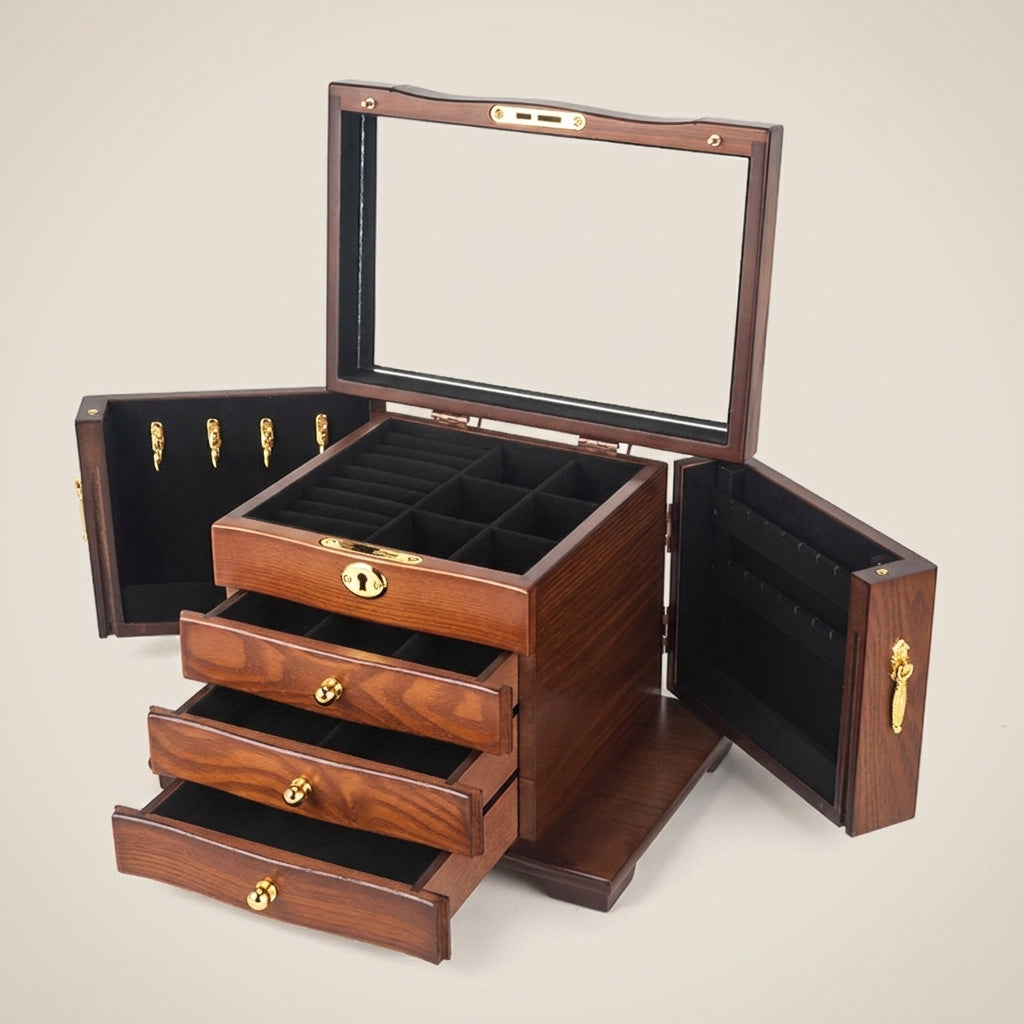 Top-down view of solid wood vintage jewelry box with antique finish and black velvet lining showing multiple velvet trays